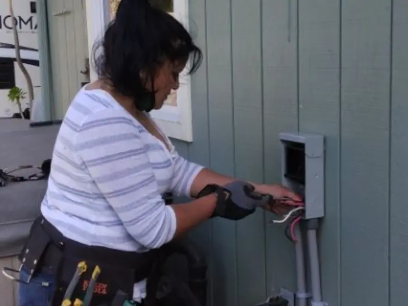 Licensed electrician wiring an exterior subpanel in Lockeford